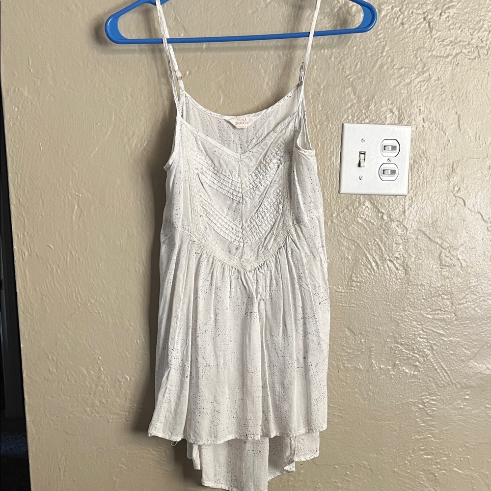 White floaty top